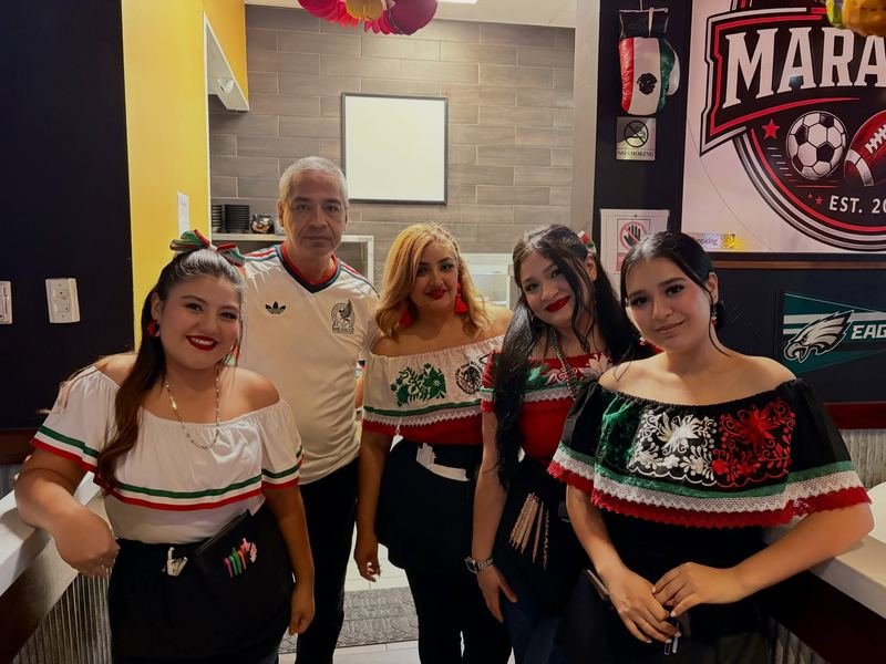 Fiesta Mexicana: Traditional Mexican dresses and green, white and red all around.