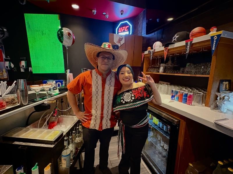 Fiesta Nights at the Bar: Sombrero and traditional dress by the bar.